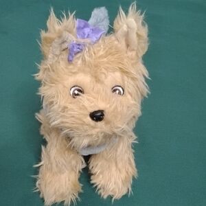 Furry Dog Toy with Purple Bow